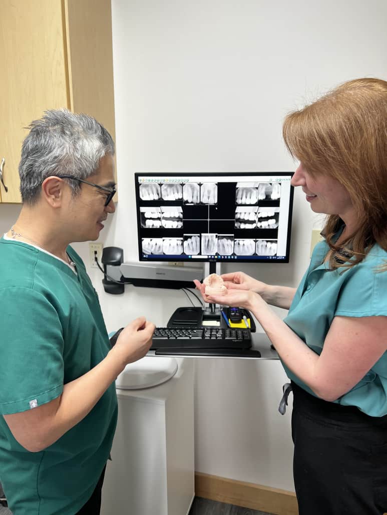 Dr Park and Dr Caylor in discussion Dr Park and Dr Caylor discussing a case